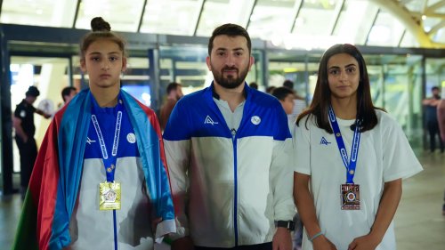 Uğur qazanan idmançılar Vətənə döndülər
